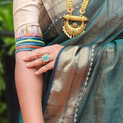 Golden Sea Green Appliqué Maheshwari Tissue Silk Saree